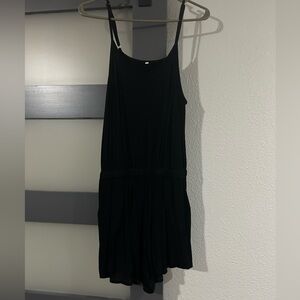 Black spaghetti strap shorts romper. Worn once. Large. Excellent used condition.